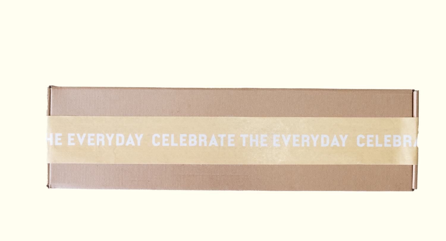 Decorative tape with 'Celebrate the Everyday' text on a white background